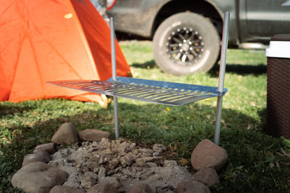 Parrilla Camping Humos de metal ajustable para cocinar al aire libre junto a fuego de campamento
